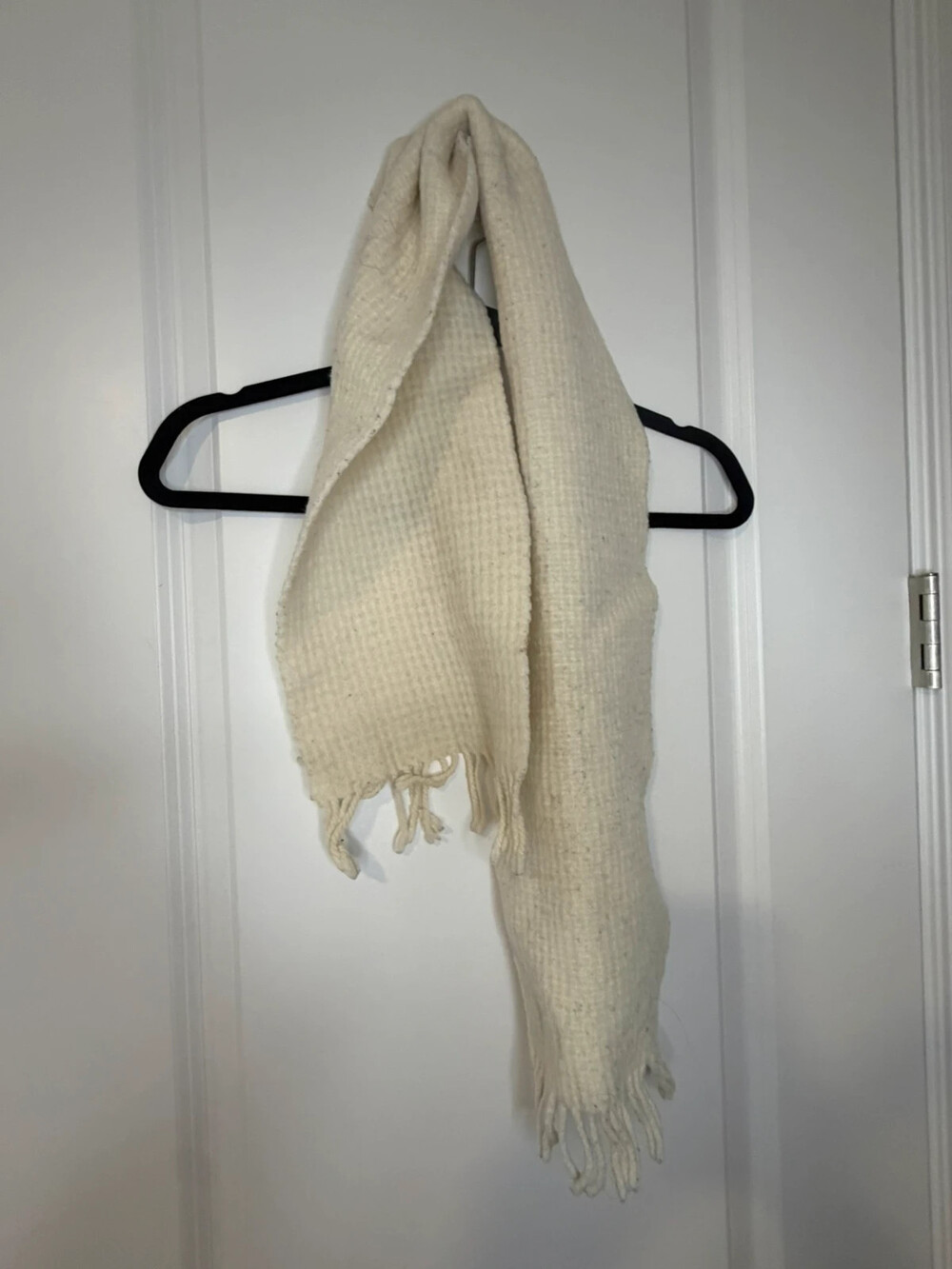 Cream colored knit scarf wool and cashmere winter ski holidays